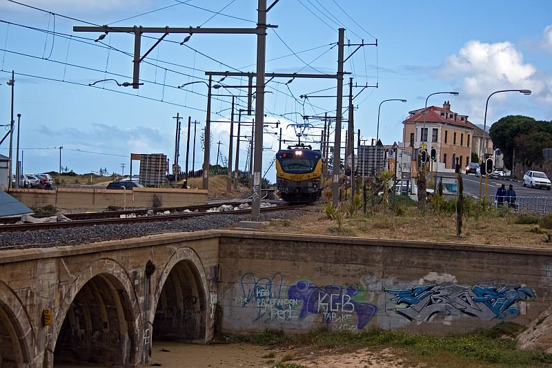 This train is also just crossing the railway crossing.