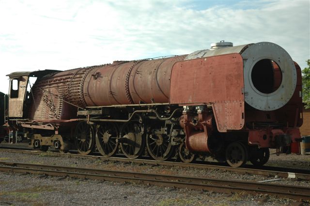 February 2010 and a partly restored 25NC stands in the open at the Rovos Rail depot. With the use of electric motive power on their trains, one wonders if this loco will ever see smoke out the stack?