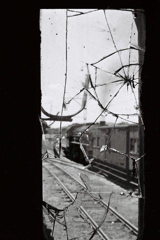 An arty view through the smashed cab side window of the GM garratt makes a nice frame for the 15CA at work on the South Yard shunt nearby