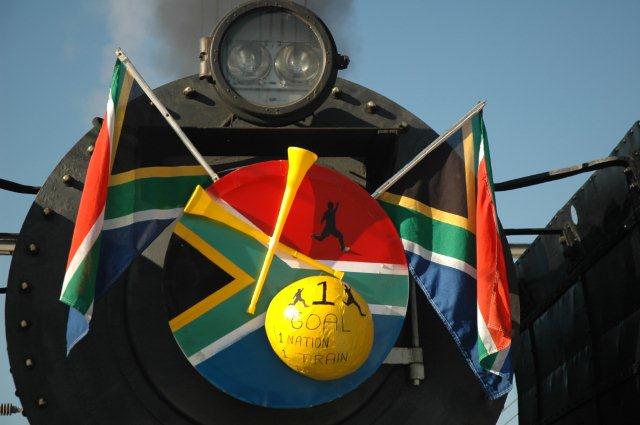 Hours of painting and thought went into the design of the board to show support for the country hosting the world cup event. Seen here at the start of the day's activities