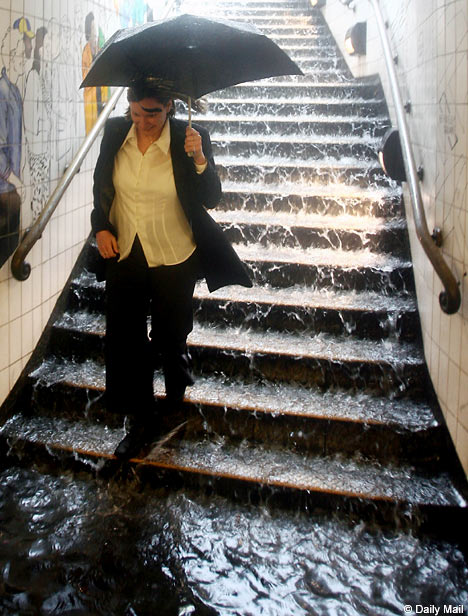 Water cascaded down the steps at Charing Cross underground station, July 2007
