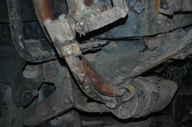 Damage to blow down cock and baffle. Fireman's side