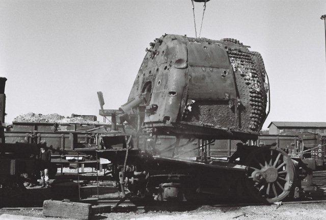 The railways crane has just lifted the firebox off its frame. The dangling mechanical stoker shaft will have no more work to do. The next journey will be to the foundry.