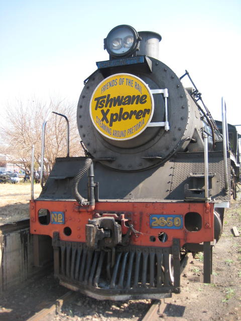 The camera is in a black box on the fireman's side, just above the number plate (on the right of the photo)