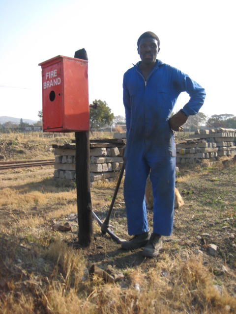 Clement stands by the newly-erected post