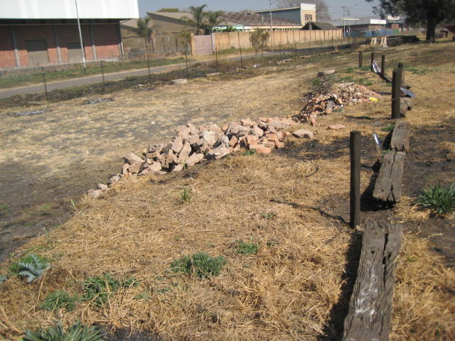 Fence posts and sleepers can be seen