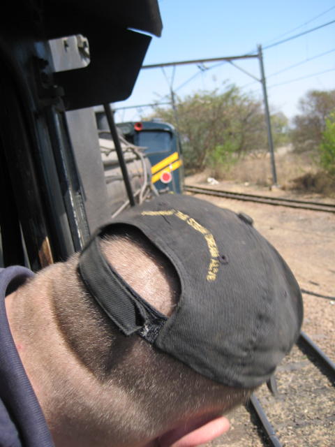 The back of the driver's head, the side of a 19D and the front of an electric unit