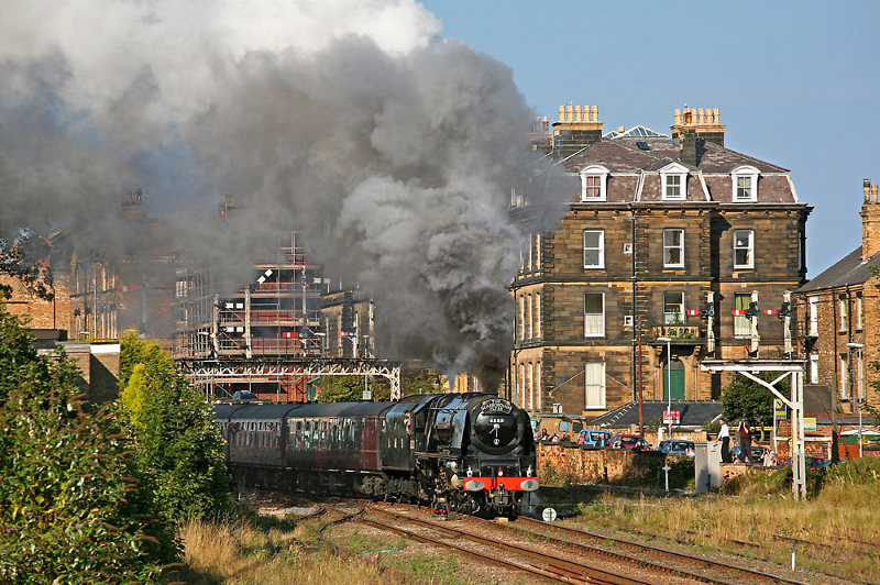 6233 Duchess of Sutherland leaves Scarborough and passes under Falsgrave signal gantry with the penultimate 'Scarborough Flyer' on 3 September.