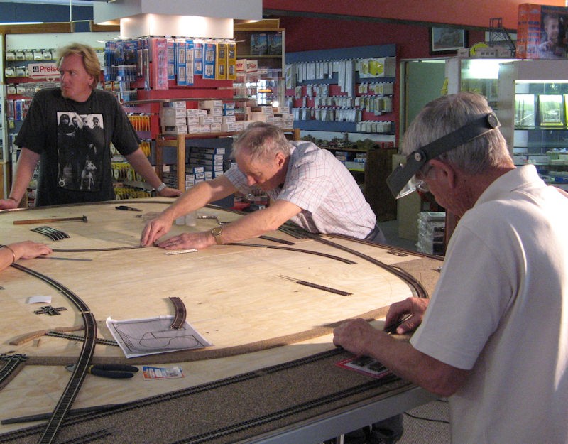 Men at work - it is unclear from the photo what actually Jorg is doing (left), but Paul (centre) is working. Eric (right) looks also like maybe he is working too.