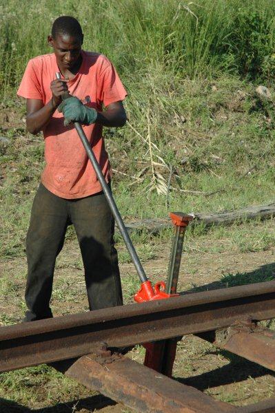 Welcome hard at work jacking up the track.
