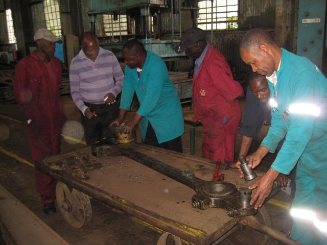 3020's rods and bushes have found their way into the RVR workshop; RVR has kindly made its facilities fully available to ensure the success of the Steam Safari. Mr Francis Waweru, a Kenyan businessman who is one of the driving forces behind the current revival of steam in Kenya, is second from left (in "civilian" clothes).