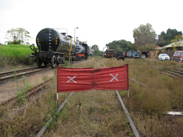 Red banner at the western end