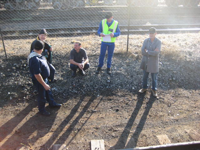 Awaiting departure from Hermanstad. Left to right: TFR Pilot Marnie, Trainee Driver Nathan, Driver Frik, Guard Dewald, Technical Inspector Robert