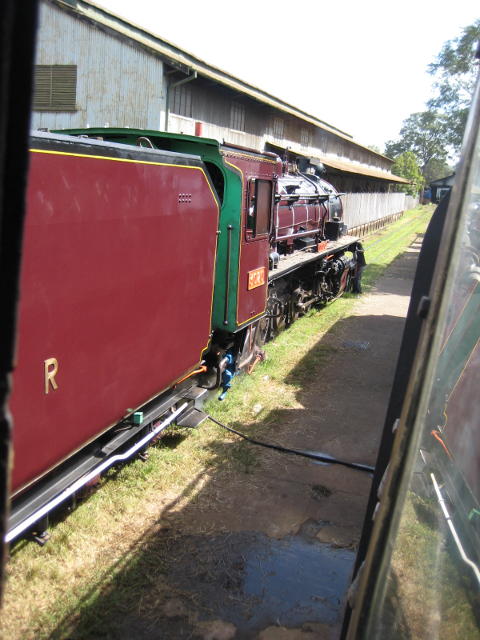 Viewed through the window of 5918, 3020 is using steam from the stationary boiler for lighting up. She will remain in steam now until she returns from Naivasha