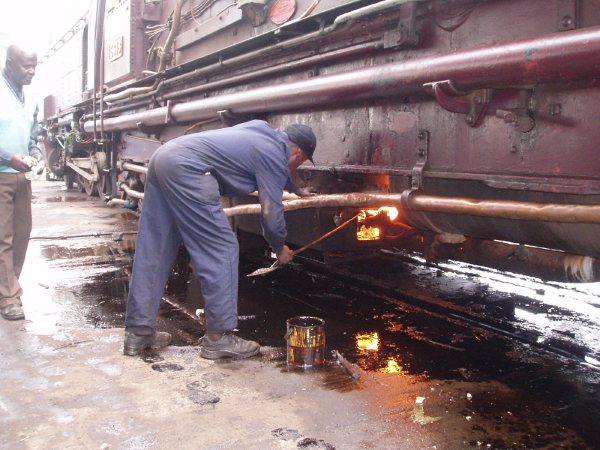 Cotton waste soaked in paraffin is used to light the burners