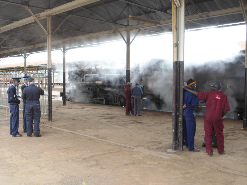 The crew, including police escort, hang around on Nairobi Station's Platform 1 awaiting our departure slot