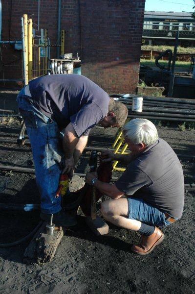 New member Theunis, assists Gabor with the element polishing