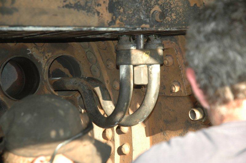 Finally inserted. Special black graphite and oil mix has been smeared on the element ends and a final tightening. One down, many more to go!