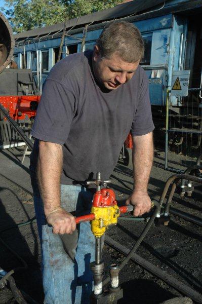 Gabor at work with the polishing up of the element heads prior to fitting in the boiler tube