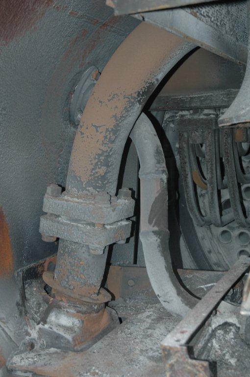 Viewed from the interior of the smokebox, the branch steam pipe that carries the live steam from the locomotive header can be clearly seen. These pipe have to be removed for the repair.