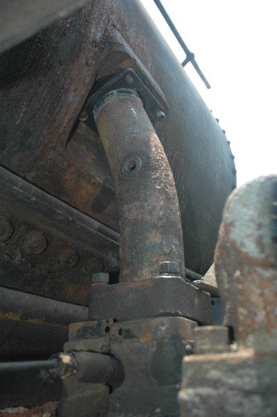 Remember the previous photos with the pipe ready to be moved? Well, the offending part was removed by Robert and with help from Steve and Gabor, it is now in place except for the fastening up.