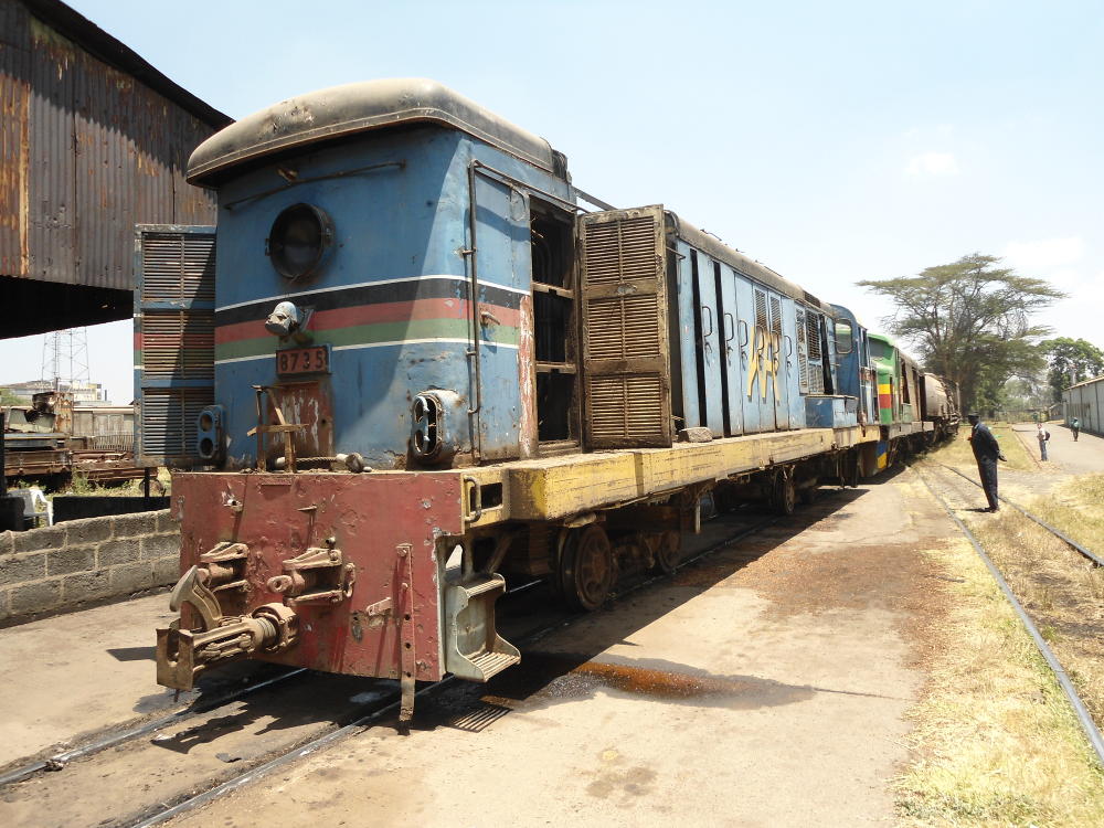 8735 was one of the dead diesels being moved, mounted on temporary bogies
