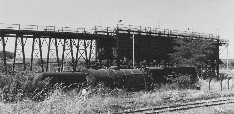 Dumped class 20 garratts at the rear of Livingstone shed in Zambia. Note the R R brass letters on the bunkers. They were all scrapped around 1994