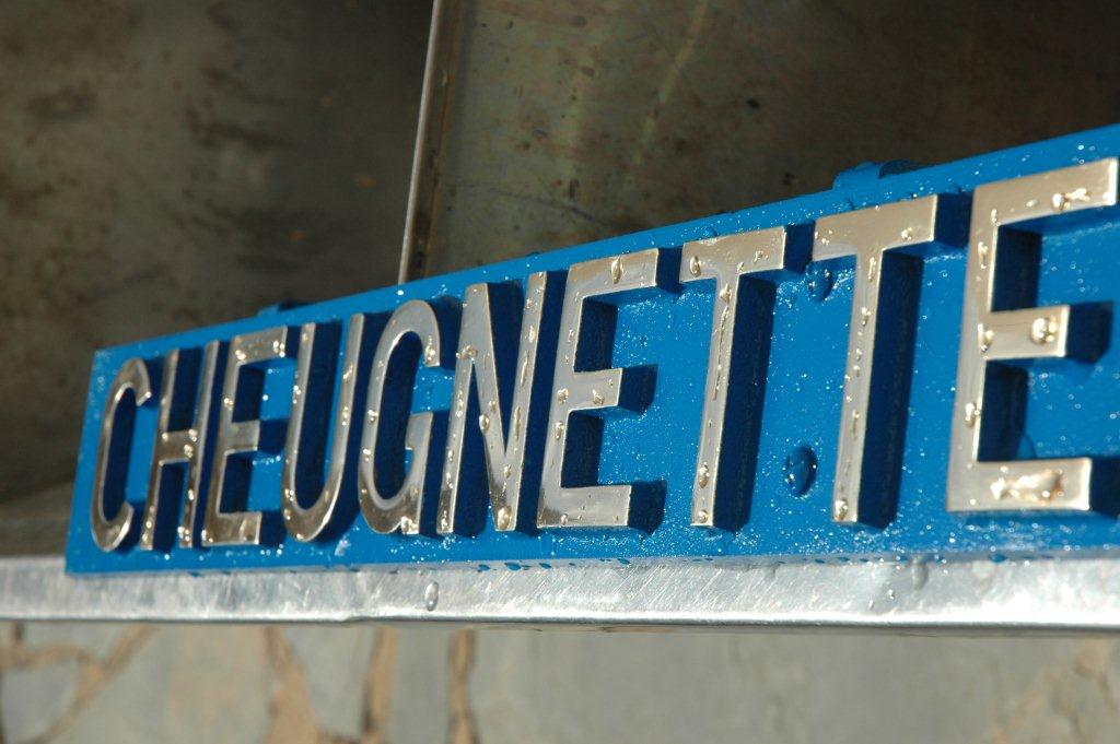 The nameplate is now completed and will dry and soon will be mounted on the headlight bracket of the 19D.