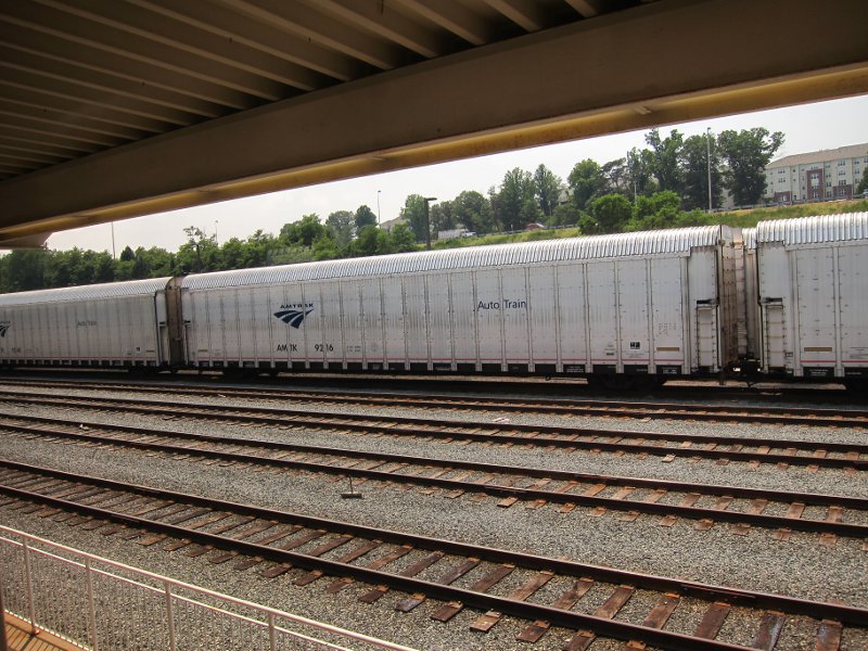 The trucks standing for loading of cars.