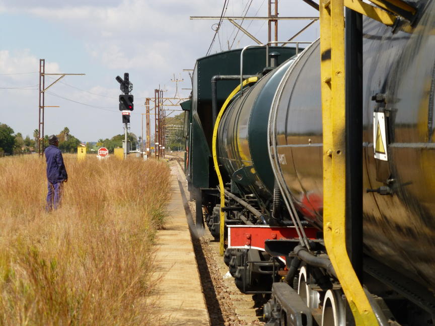 Nathan speaks to CTC on the phone to get authority to move the locomotive to the short shunting neck to clean fire