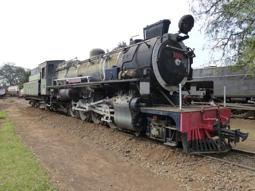 In this photo the paintwork looks greyish. In reality it looks a sort of sandy yellow. The actual paint is maroon!