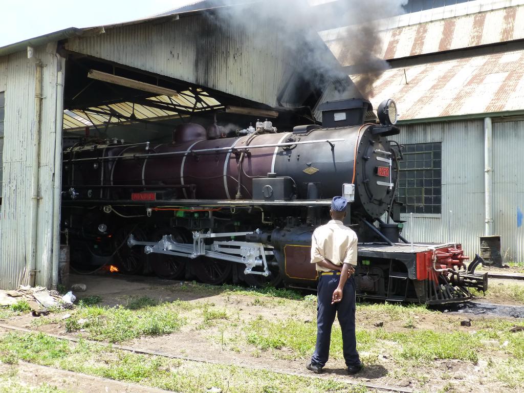 One of the security guards contemplates the loco