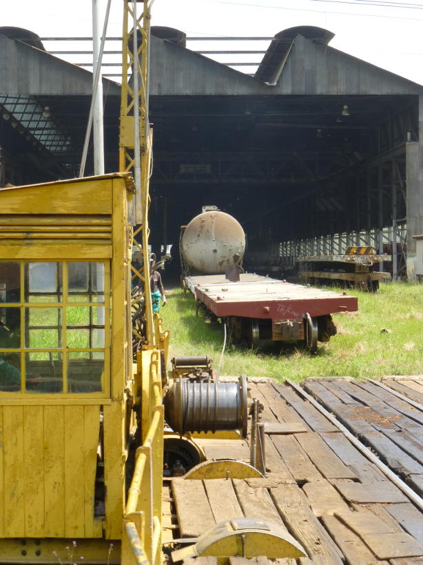 A vehicle being winched onto the wagon traverser