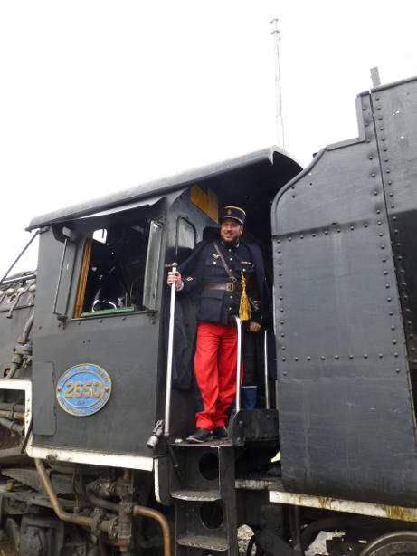 One passenger is wearing the dress uniform of a French officer