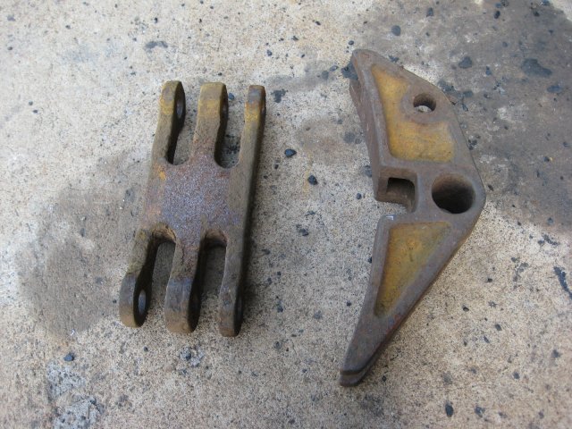 A composite brake block holder posed next to one type of hanger<br /><br />Photo by John Ashworth 23/02/08