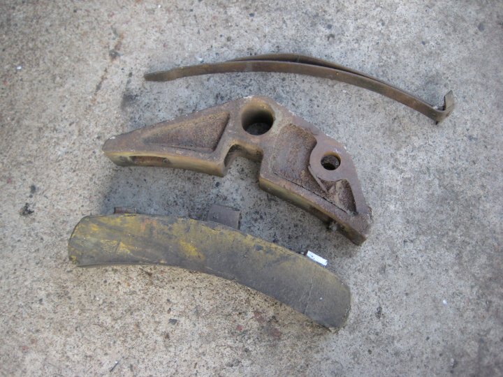 From the bottom - a composite brake block, its holder, and the spring that holds it in<br /><br />Photo by John Ashworth 24/02/08