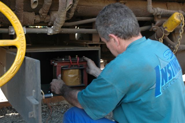 Steve Smith at work on the mainline coach, figuring out if the transformer should stay or go!<br /><br />Photo by Nathan Berelowitz 18/08/07