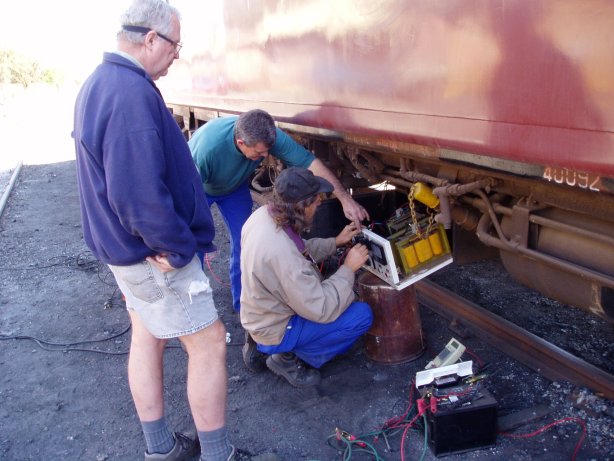 Tom, Steve and Mike remove a defective transformer<br /><br />Photo by John Ashworth 18/08/07