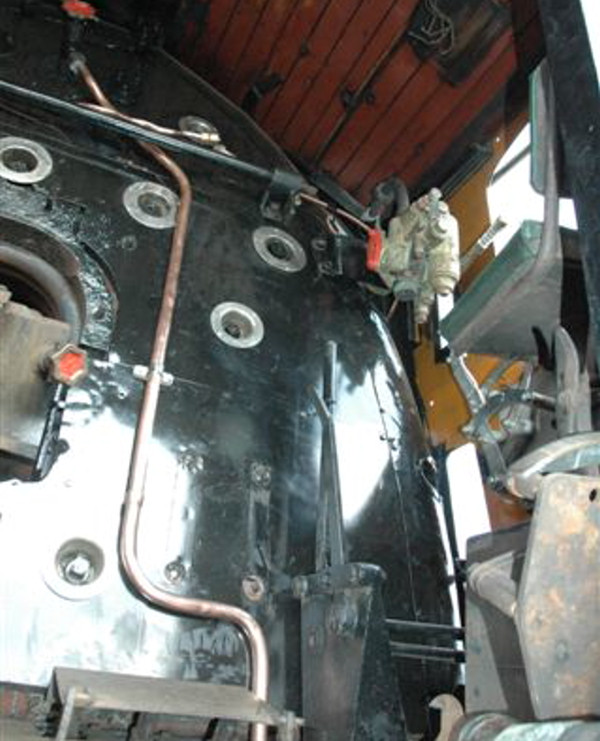 THE DRIVERS SIDE VIEWED FROM THE INSPECTION PIT. THE SCUM COCK PIPE HAS BEEN<br />FITTED, SPACED FROM THE BOILER AND FITTED WITH A NICKEL PLATED CLAMP.<br />SO THE PROGRESS GOES ON. TAKEN BY NATHAN 15/04/2007