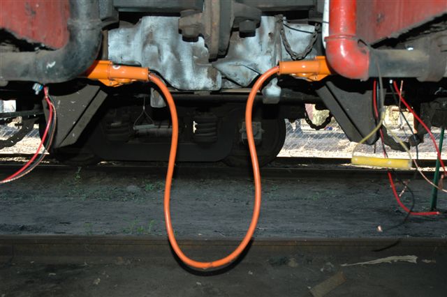 Plugged in. The connecting harness in position. This is how our coaches will<br />be powered up. Hats off to the live wires at FOTR.<br /><br />Photo by Nathan Berelowitz 18/08/07