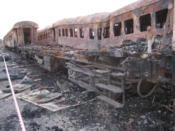 The wooden vehicle has burned right down to the frame