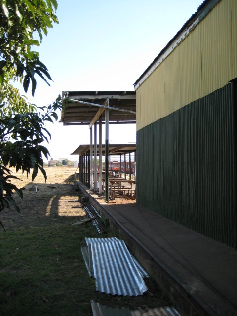 Looking west along the goods shed. The old (high) and new (low) roofs can be clearly seen