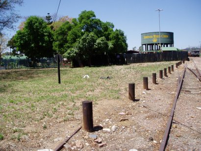 What is buried under the lawn in front of Sebenza Weedchem at Capital Park?<br /><br />Photo by John Ashworth 05/10/06