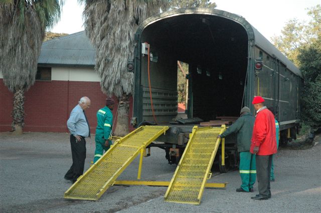 New conversion to Rovos fleet is the car coach. Preparing the ramp prior to loading, vehicles are driven inside from the parking area at the main entrance, and the coach is then taken and placed on the main train as the first vehicle
