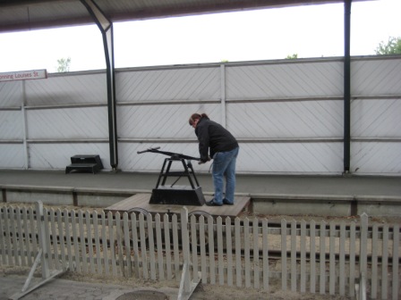 A staff member demonstrates how it should be done