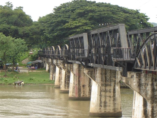 The famous steel bridge constructed with prisoner of war labour and which the Allied bombers blasted the two middle spans. Hence the difference in the way the bridge looks