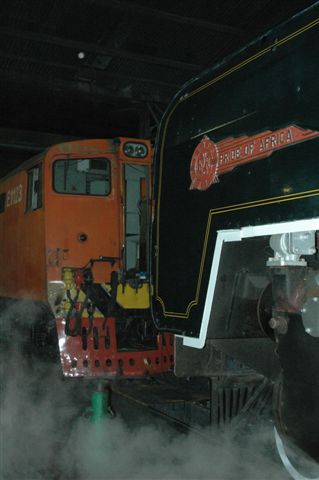 Facing up, class 25NC 3442 giving her new electric companion, class 5E1, the hot eye! Soon, these units will be operating on the main line and the steam days may become limited
