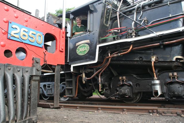 Willem grins as the two locos pass each other<br /><br />Photo by Chris Janisch 04/11/07