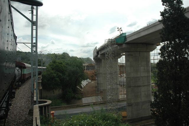 The same bridge scene as the previous pic but from the trackside as FOTR Tshwane Xplorer heads for Rissik station. This scene is just out of Pretoria station.