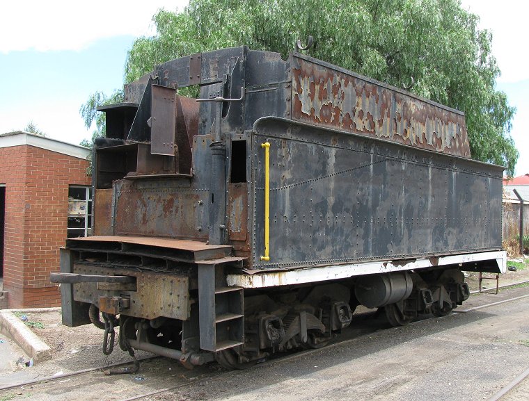 And looking forlorn without her loco, the tender sits on the other side of the road
